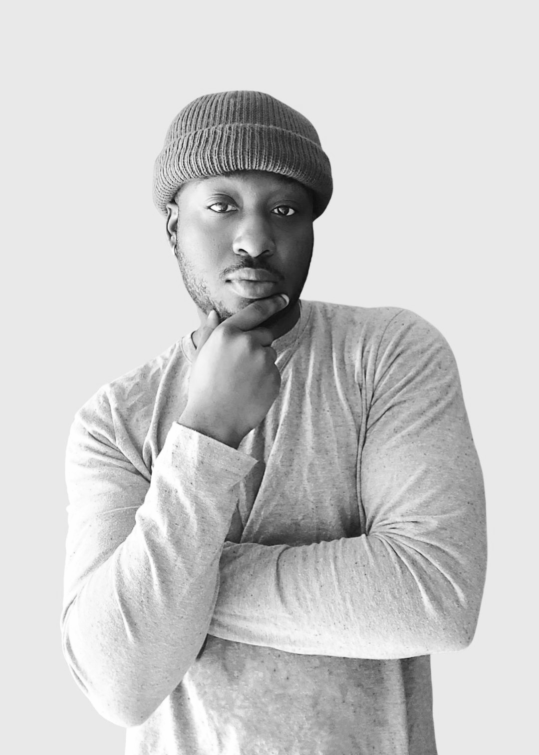 TAVE, founder of Taymo Digital, in a black-and-white portrait
