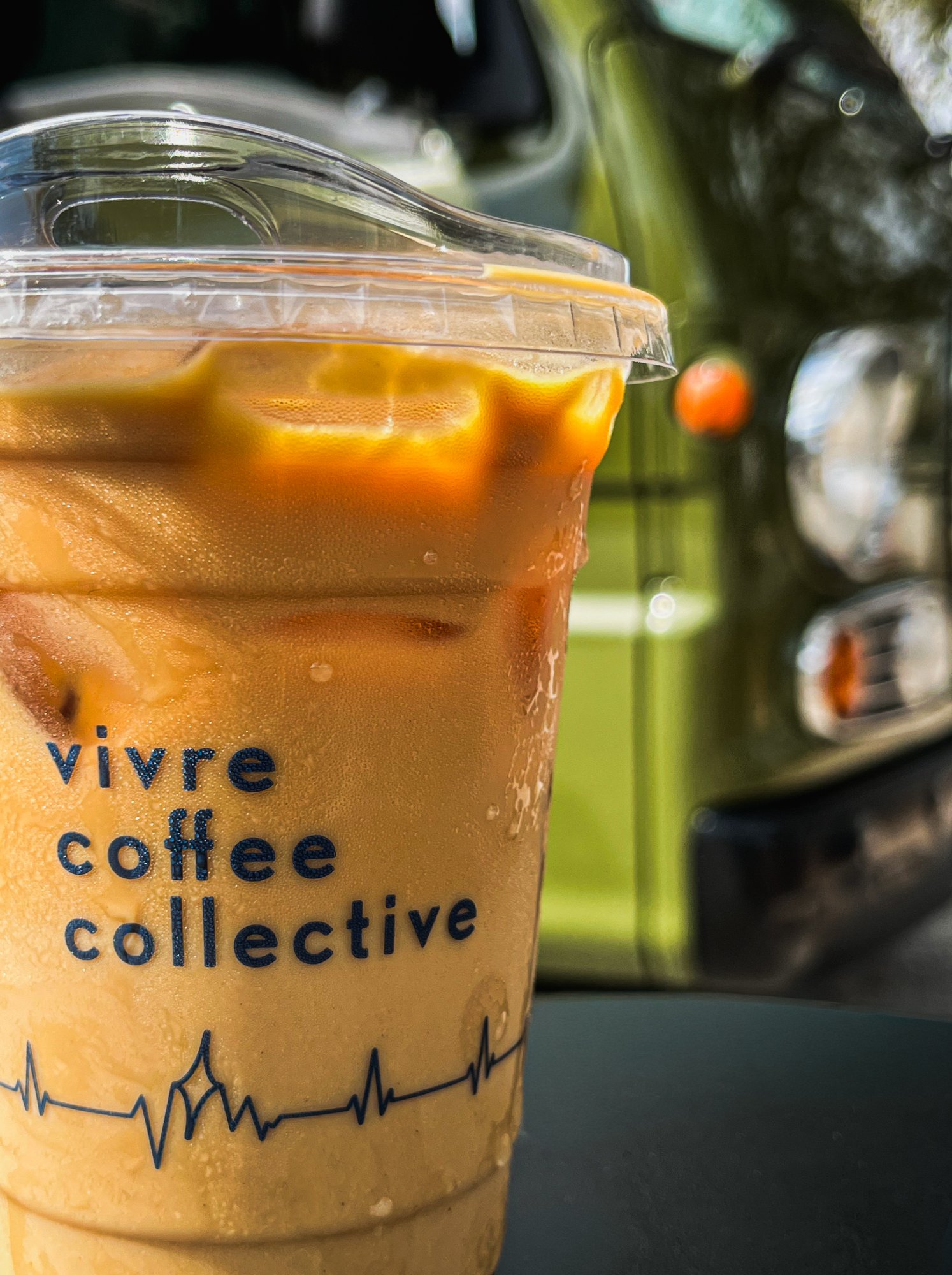 Original photograph of a Vivre Coffee Collective iced latte cup